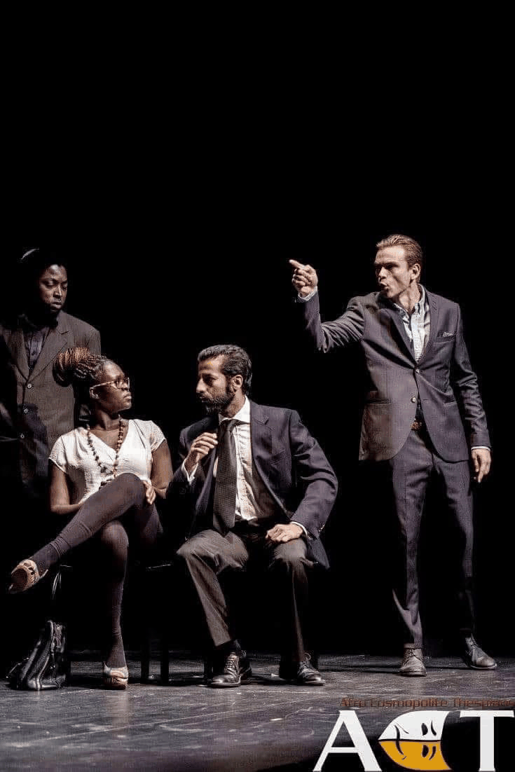 Tense courtroom confrontation from The Merchant of Venice with Gratiano pointing while Shylock sits in profile.